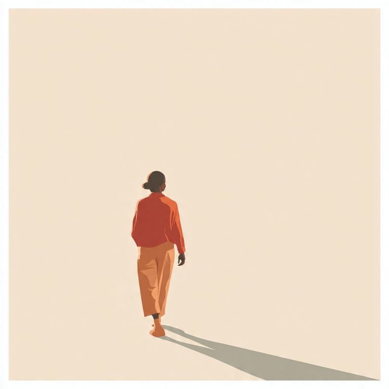 Persona caminando hacia el horizonte, vestida con una chaqueta roja y pantalones claros.